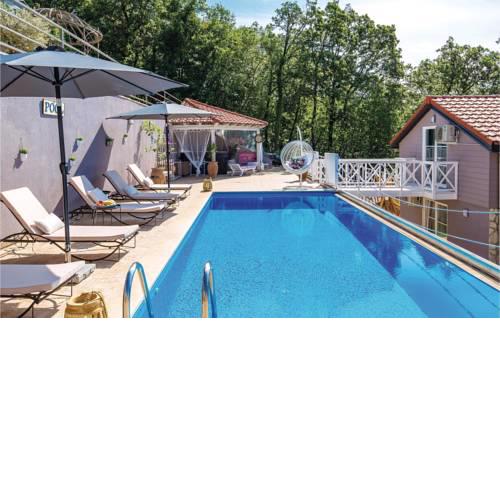 Four-Bedroom Holiday Home in Veprinac