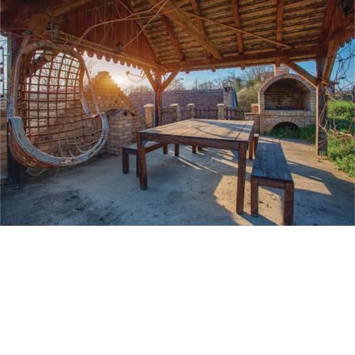 Four-Bedroom Holiday Home in Zmajevac