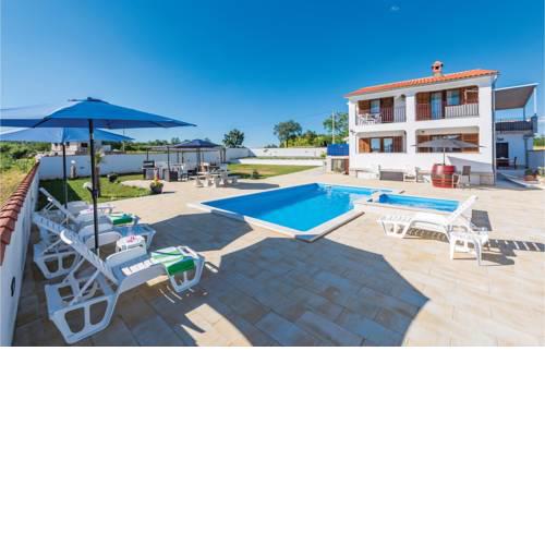 Four-Bedroom Holiday Home in Zminj