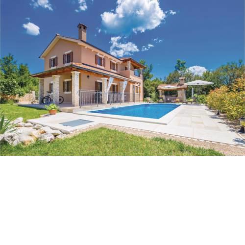 Four-Bedroom Holiday home Kras with a Fireplace 09