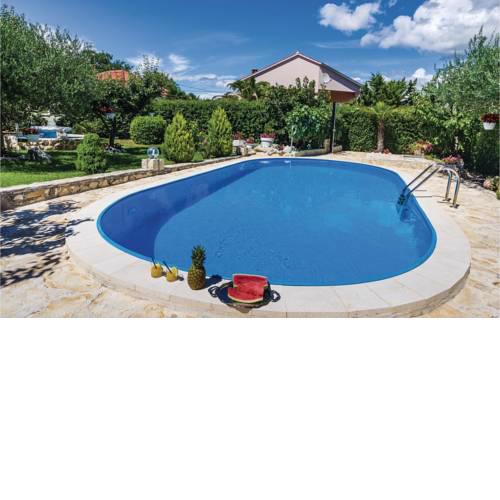 Four-Bedroom Holiday home Lovinac with an Outdoor Swimming Pool 09