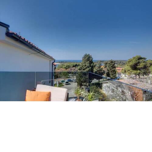 Holiday Apartment Indije with a Sea View