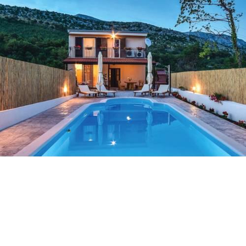House Omis Naklice with a private Pool