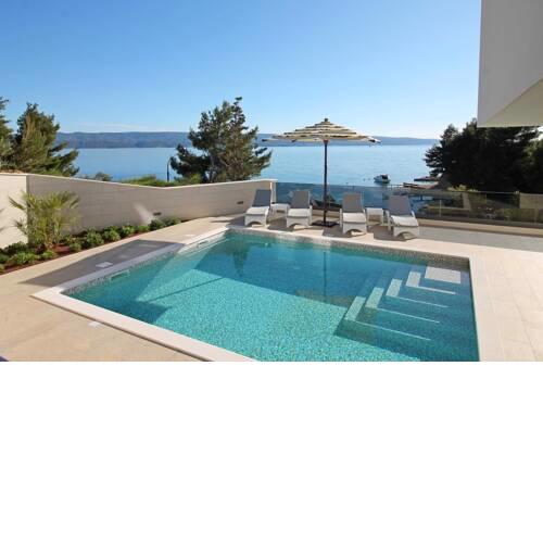 Luxury, seafront Villa Petra with heated pool only 50m from beach