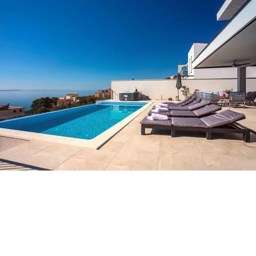 NEW! Villa Nano, 4 bedrooms, jacuzzi, heated pool, sea views, pebble beach 850m