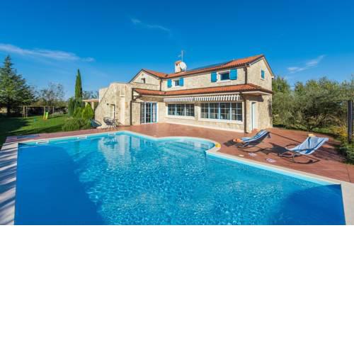 Newly built stone villa Mia with garden and pool