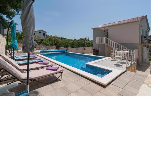Nice home in Maslinica with Outdoor swimming pool, WiFi and 4 Bedrooms