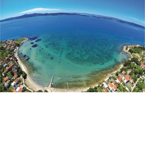 Nice home in Prkos with Outdoor swimming pool, WiFi and 3 Bedrooms