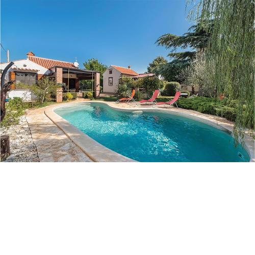 Nice home in SiSan with 4 Bedrooms