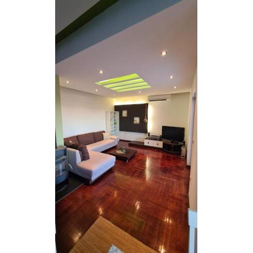 Oasis apartment with sea view and garden