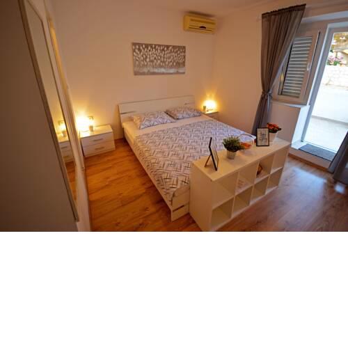 Room with balcony near the sea