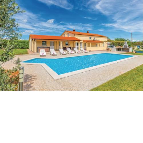 Six-Bedroom Holiday Home in Marcana