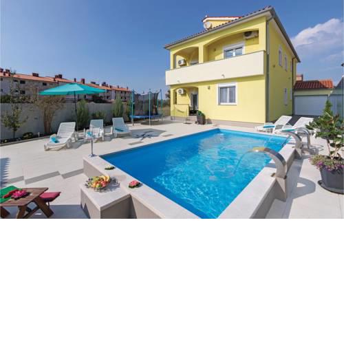 Six-Bedroom Holiday Home in Peroj