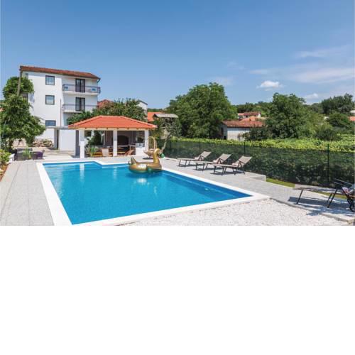 Six-Bedroom Holiday Home in Zmijavci
