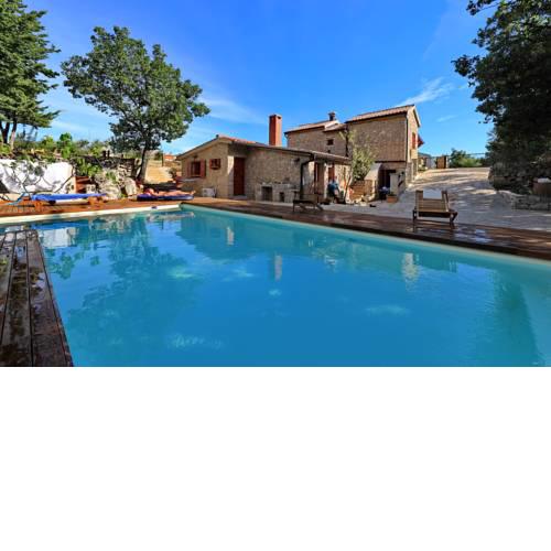 Stone house M&A with pool