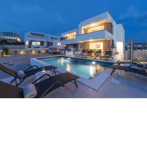 Sunset mood 2 modern sea view ap with a pool