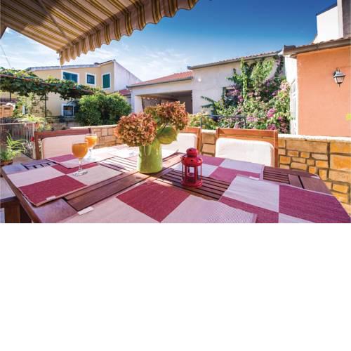 Three-Bedroom Apartment in Biograd