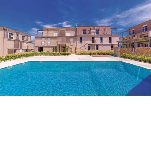 Three-Bedroom Apartment in Povljana