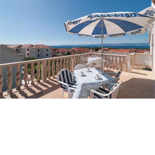 Three-Bedroom Apartment in Supetar