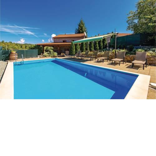 Three-Bedroom Holiday Home in Jurdani