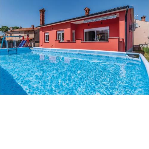 Three-Bedroom Holiday Home in Marcana