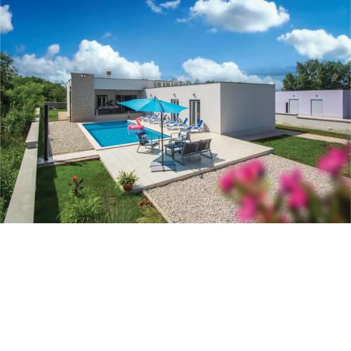 Three-Bedroom Holiday Home in Marici