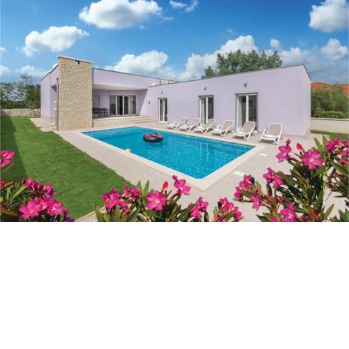 Three-Bedroom Holiday Home in Marici