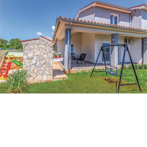 Three-Bedroom Holiday Home in Skatari