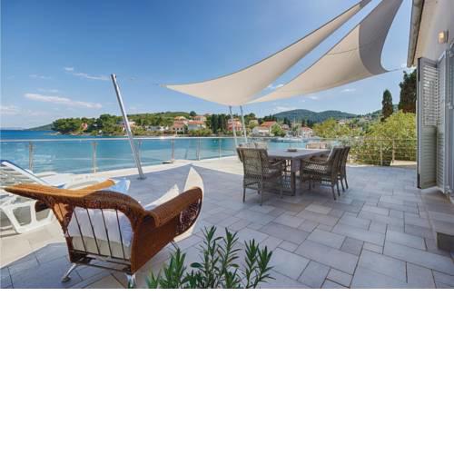 Three-Bedroom Holiday Home in Zman