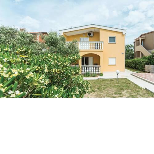 Two-Bedroom Apartment in Povljana
