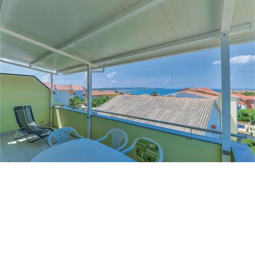 Two-Bedroom Apartment in Povljana