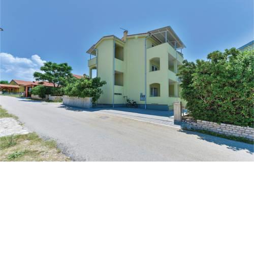 Two-Bedroom Apartment in Povljana