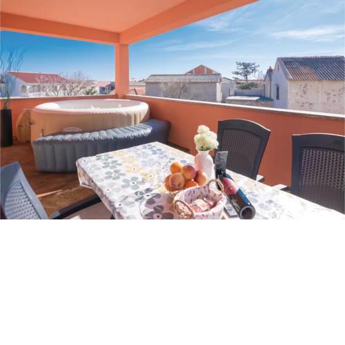 Two-Bedroom Apartment in Povljana