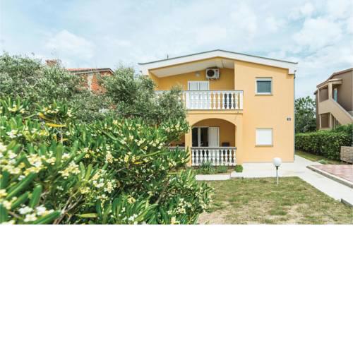 Two-Bedroom Apartment in Povljana
