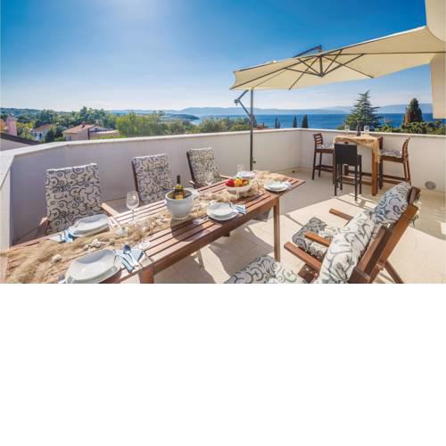 Two-Bedroom Apartment Njivice with Sea View 06