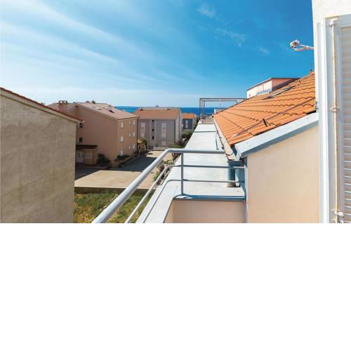 Two-Bedroom Apartment Novalja with Sea View 04