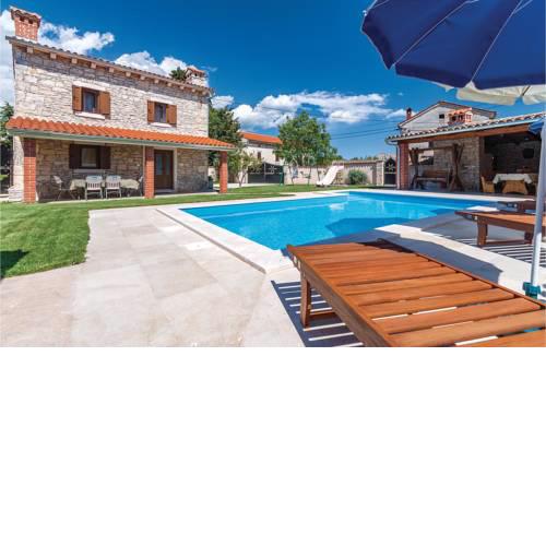 Two-Bedroom Holiday Home in Divsici
