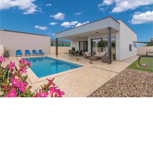 Two-Bedroom Holiday Home in Peroj