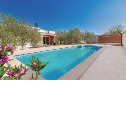 Two-Bedroom Holiday home Jezera with a Fireplace 05